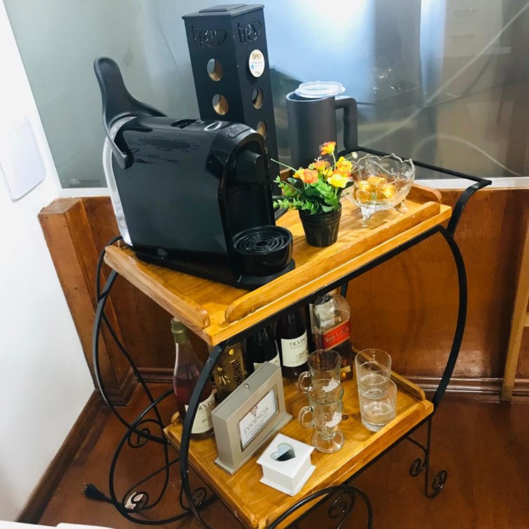 Carrinho de café e recepção da Evidência Comunicação